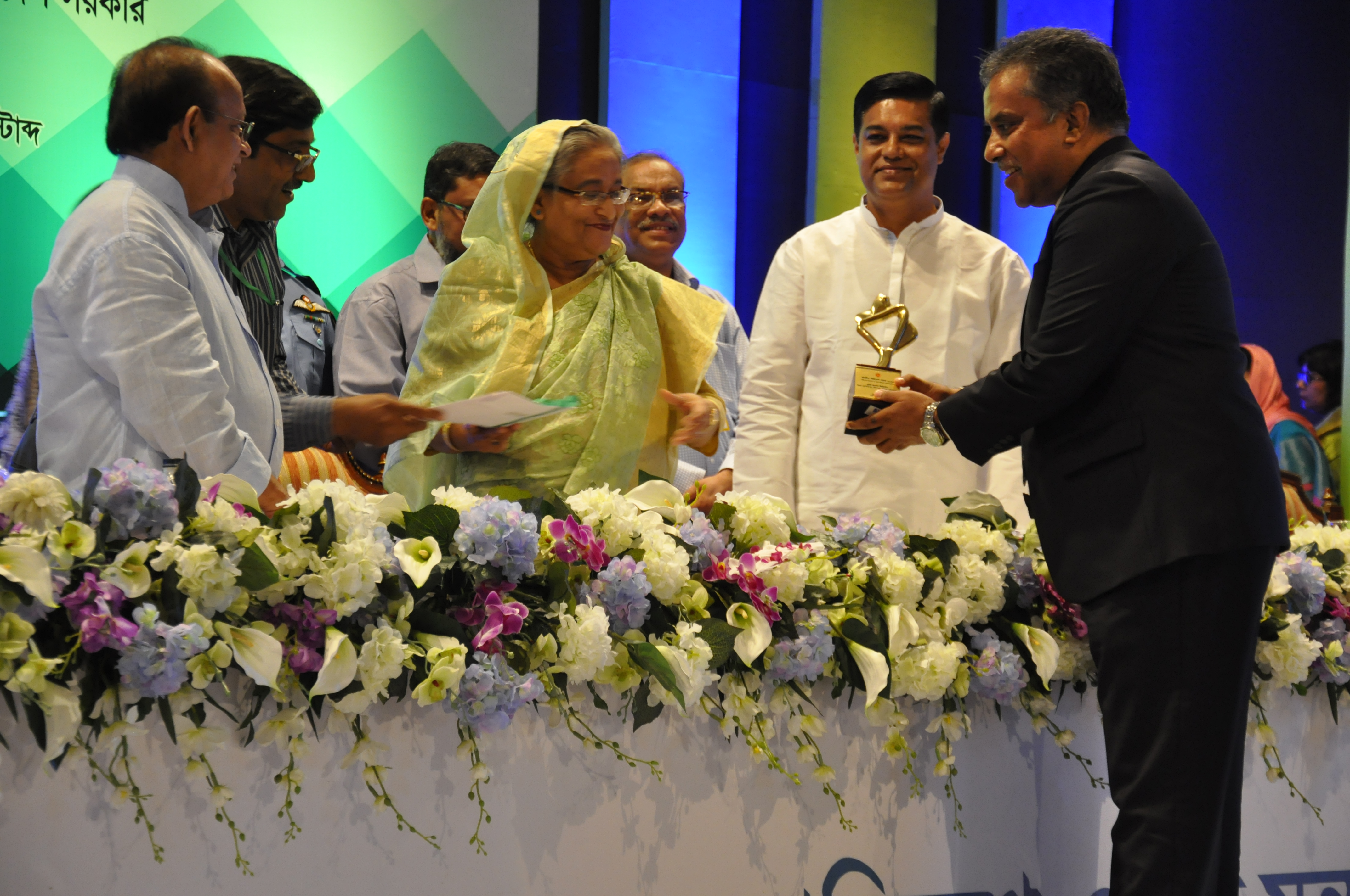 Mr. Md. Fazlul Hoque is receiving National Award on Environments 2016 from Prime Minister Sheikh Hasina 